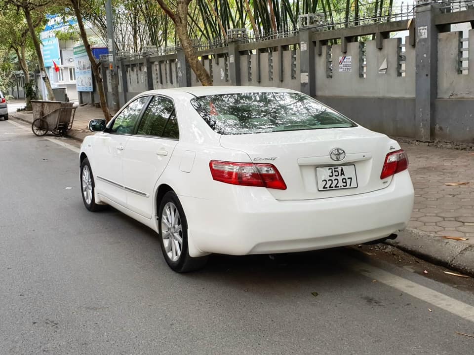 Cần bán xe Toyota Camry LE cũ 2009 màu vàng cát đăng ký 2010 một chủ từ đầu